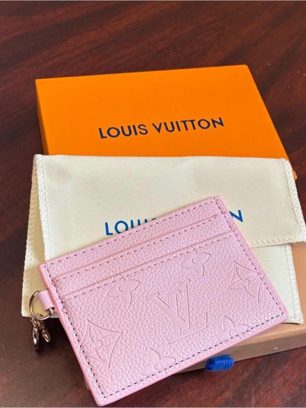 Louis Vuitton Light Pink
Embossed Monogram Card
Case with Charm